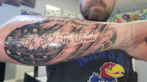 Explore red bird tattoo ideas, creative tattoo ideas in Ottawa, available at Purple Rose Tattoos & Piercings