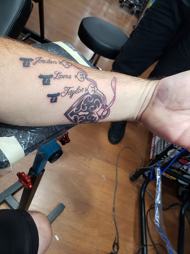 Explore initial finger tattoo ideas, creative tattoo ideas in Saint Marys, available at WarHawk Tattoo Company ST MARYS