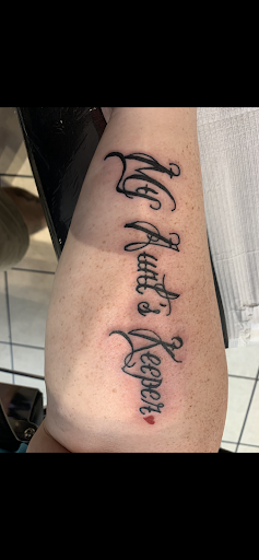 Find simple cat tattoo ideas for your next unique tattoo in Moultrie at Ink Addiction Tattoo Moultrie