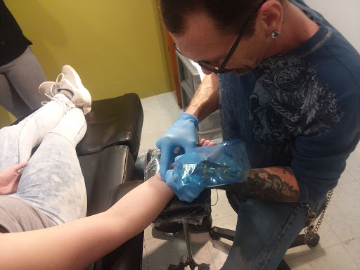 Explore halloween movie tattoo ideas, creative tattoo ideas in Salem, available at Outwest Tattoo and body piercing ,30 years of tattooing,only life time guarantee