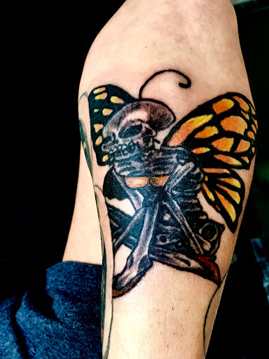 Explore evil eye tattoo ideas, creative tattoo ideas in Panama City Beach, available at Revolution Tattoo & Body Piercing