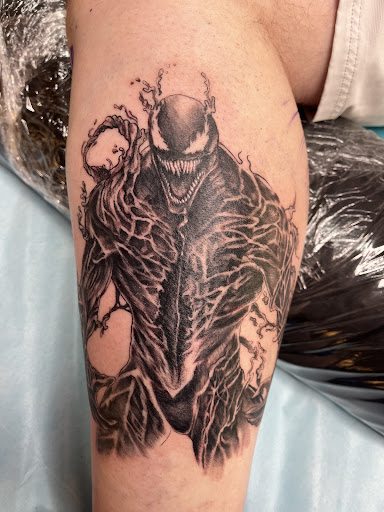 Explore feminine tattoo ideas, creative tattoo ideas in Holly Ridge, available at Evolution Tattoo Studio