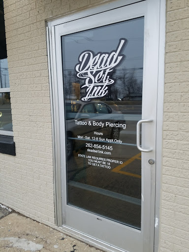 Explore skull and rose tattoo ideas, creative tattoo ideas in Kenosha, available at Dead Set Ink