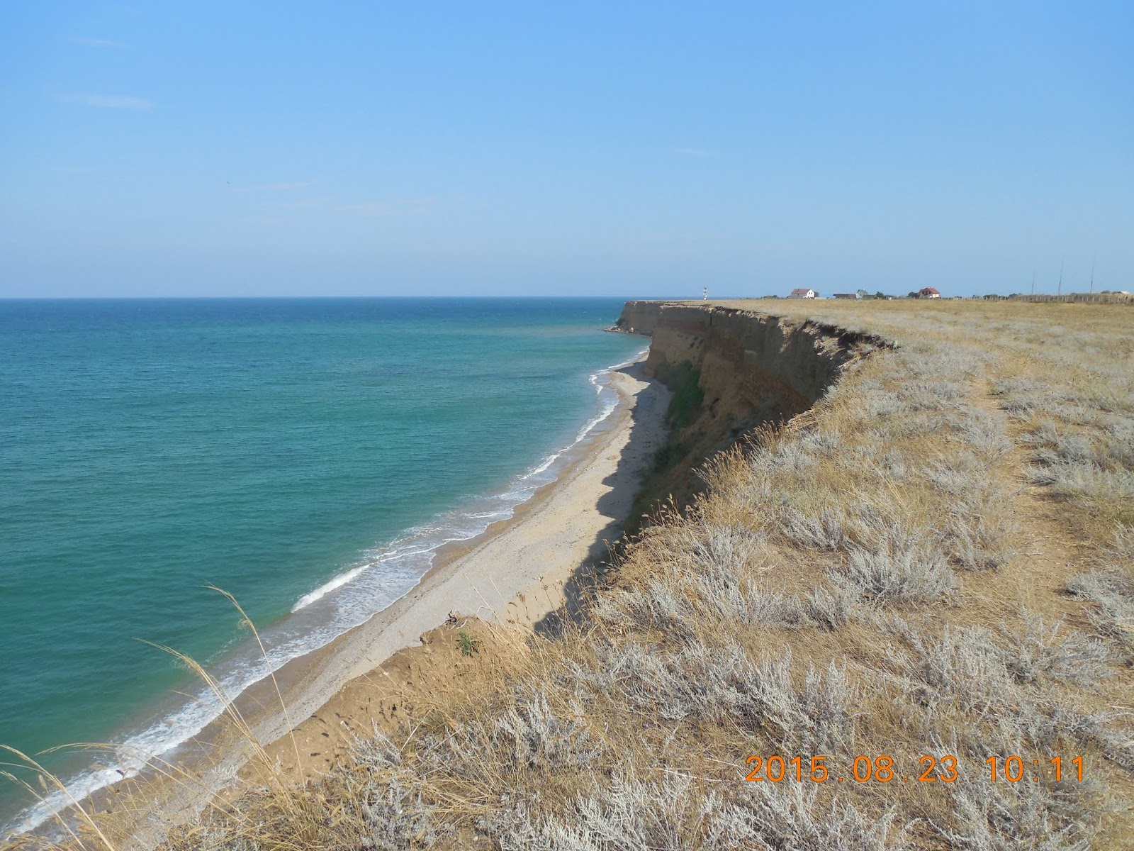 Photo of Kacha beach and the settlement