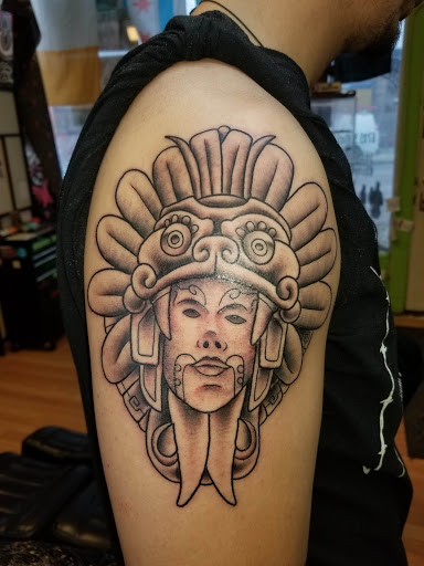 Explore armband tattoo ideas for men, creative tattoo ideas in Chicago, available at Mind Crusher Tattoo