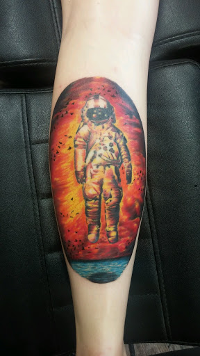 Explore badass tattoo ideas for men, creative tattoo ideas in Littleton, available at Clean Slate Tattoo & Body Piercing Studio