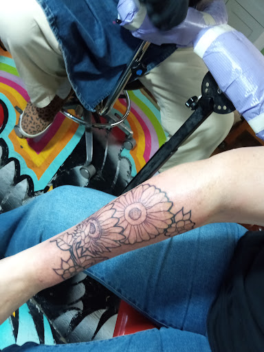 Explore back of thigh tattoo ideas, creative tattoo ideas in Shreveport, available at Red Handed Tattoo