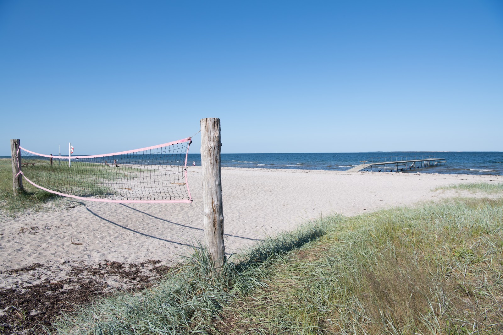 Foto de Holken Beach con arena beige superficie