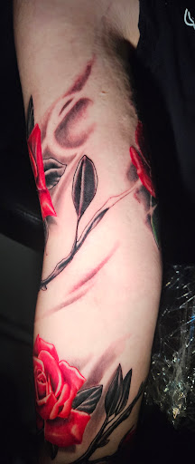 Explore jamaican tattoo ideas, creative tattoo ideas in Angola, available at Hoodlum Ink