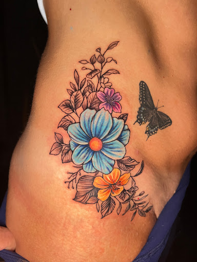 Explore cute dinosaur tattoo ideas, creative tattoo ideas in Rowlett, available at Sinners Tattoo Studio and Supply
