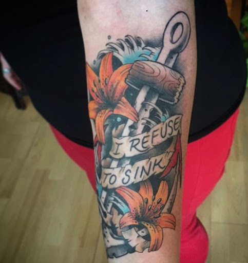 Explore green arrow tattoo ideas, creative tattoo ideas in Lawrence, available at Standard Electric Tattooing