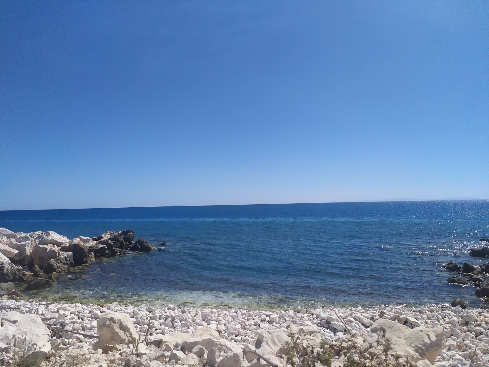 Zdjęcie Paliopotamos beach z poziomem czystości głoska bezdźwięczna