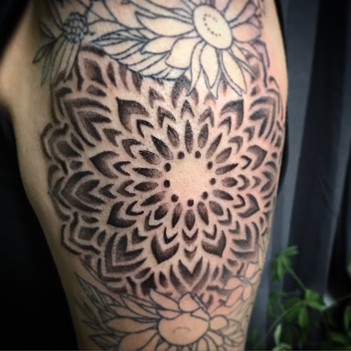 Explore ankle tattoo ideas for women, creative tattoo ideas in Tecumseh, available at Lucid Tattoo Gallery