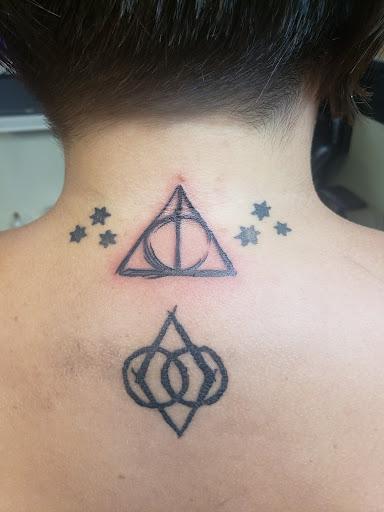 Explore mens back shoulder tattoo ideas, creative tattoo ideas in Martins Ferry, available at Hot Rod Tattooing