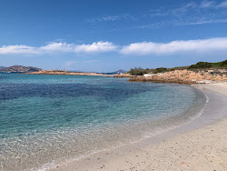 Spalmatore di Terra Beach'in fotoğrafı düz bir kıyı şeridi ile birlikte