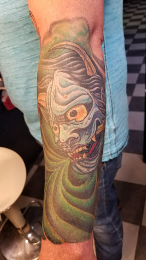 Explore flower back tattoo ideas, creative tattoo ideas in Fritch, available at Stars & Stripes Electric Tattoos