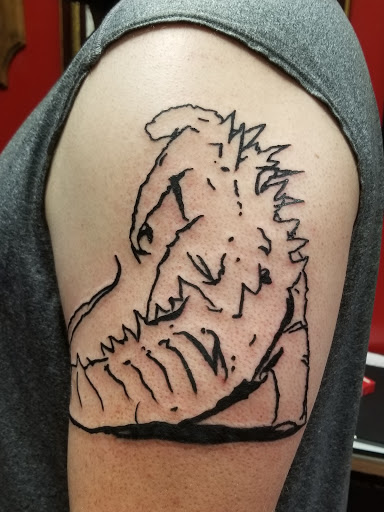 Explore thigh tattoo ideas for females, creative tattoo ideas in Powell, available at Against All Odds Tattoos and Piercings