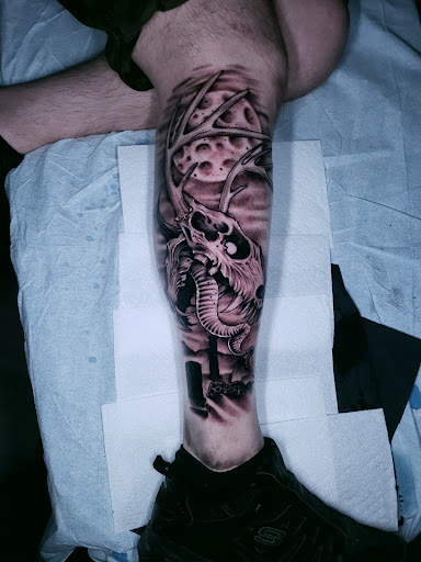 Explore skull and roses tattoo ideas, creative tattoo ideas in College Station, available at Legacy Tattoo Lounge