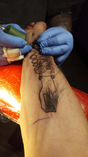 Tattoo Shop «Magnum Tattooing», reviews and photos, 2317 Division Ave S, Grand Rapids, MI 49507, USA