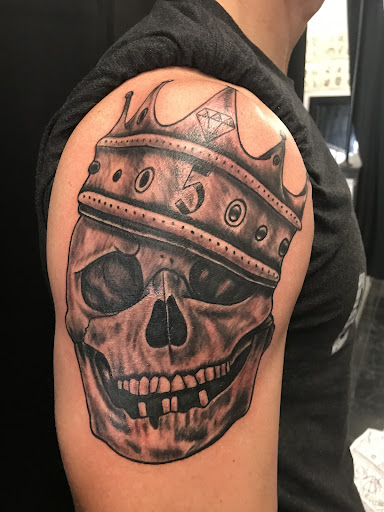 Explore honor tattoo ideas, creative tattoo ideas in Rogers, available at Jimmy Romance Tattoo & Body Piercing