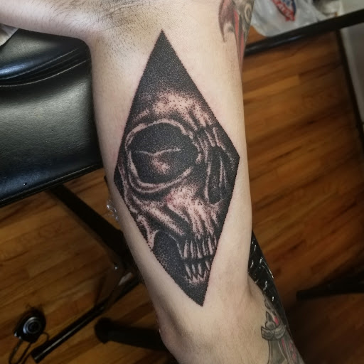 Explore cover up tattoo ideas for men, creative tattoo ideas in Asheboro, available at Wonderland Tattoo