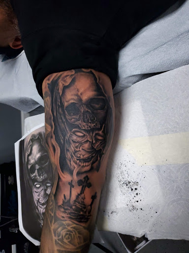 Explore tattoo cover up ideas for guys, creative tattoo ideas in Bakersfield, available at KUSTOM CREATIONS TATTOO & PIERCING STUDIO