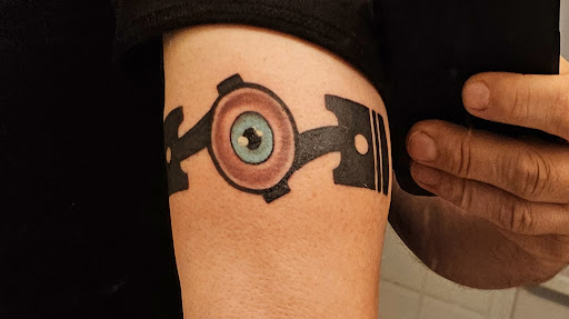 Explore unique tramp stamp tattoo ideas, creative tattoo ideas in Georgetown, available at Iron Rite Tattoo South