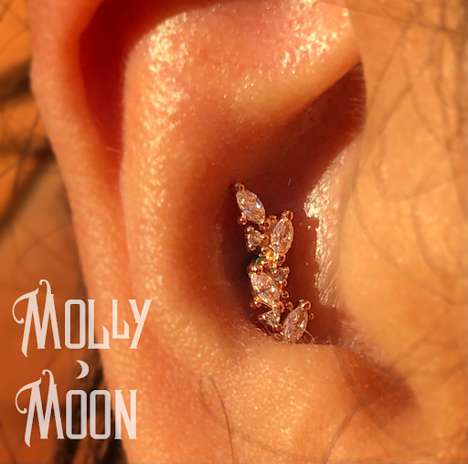 Find cool emo tattoo ideas for your next unique tattoo in Oshkosh at Piercings by Molly Moon at 920 Tattoo and Piercing