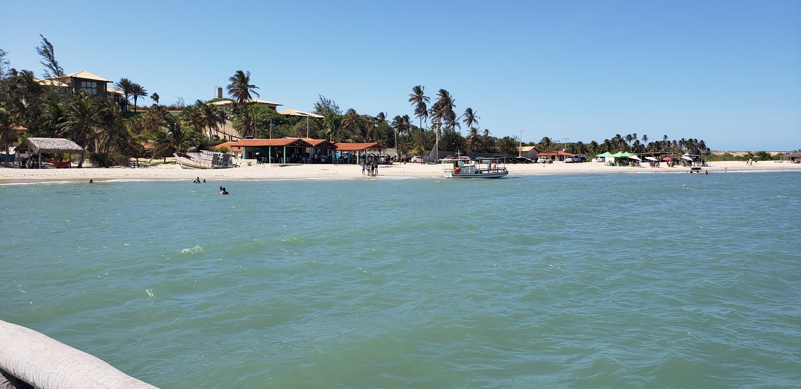 Foto van Strand van Canto Da Barra met turquoise puur water oppervlakte
