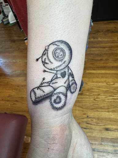 Explore fishing pole tattoo ideas, creative tattoo ideas in Rapid City, available at Elegant Ink Tattoos And Piercings