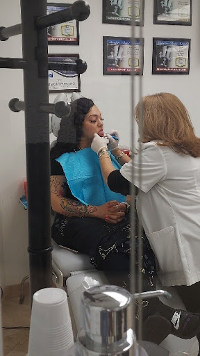 Explore iris flower tattoo ideas, creative tattoo ideas in Myrtle Beach, available at Professional Body Piercing by Jackie