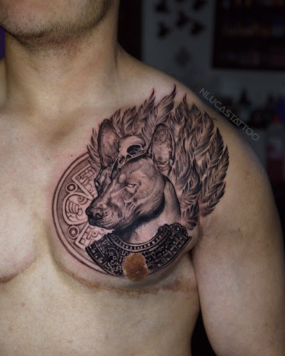 Find under boob tattoo ideas for your next unique tattoo in Culver City at Art Collector Tattoo