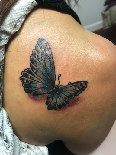 Explore knee cap tattoo ideas, creative tattoo ideas in Center Line, available at Elite Ink Tattoo Studios