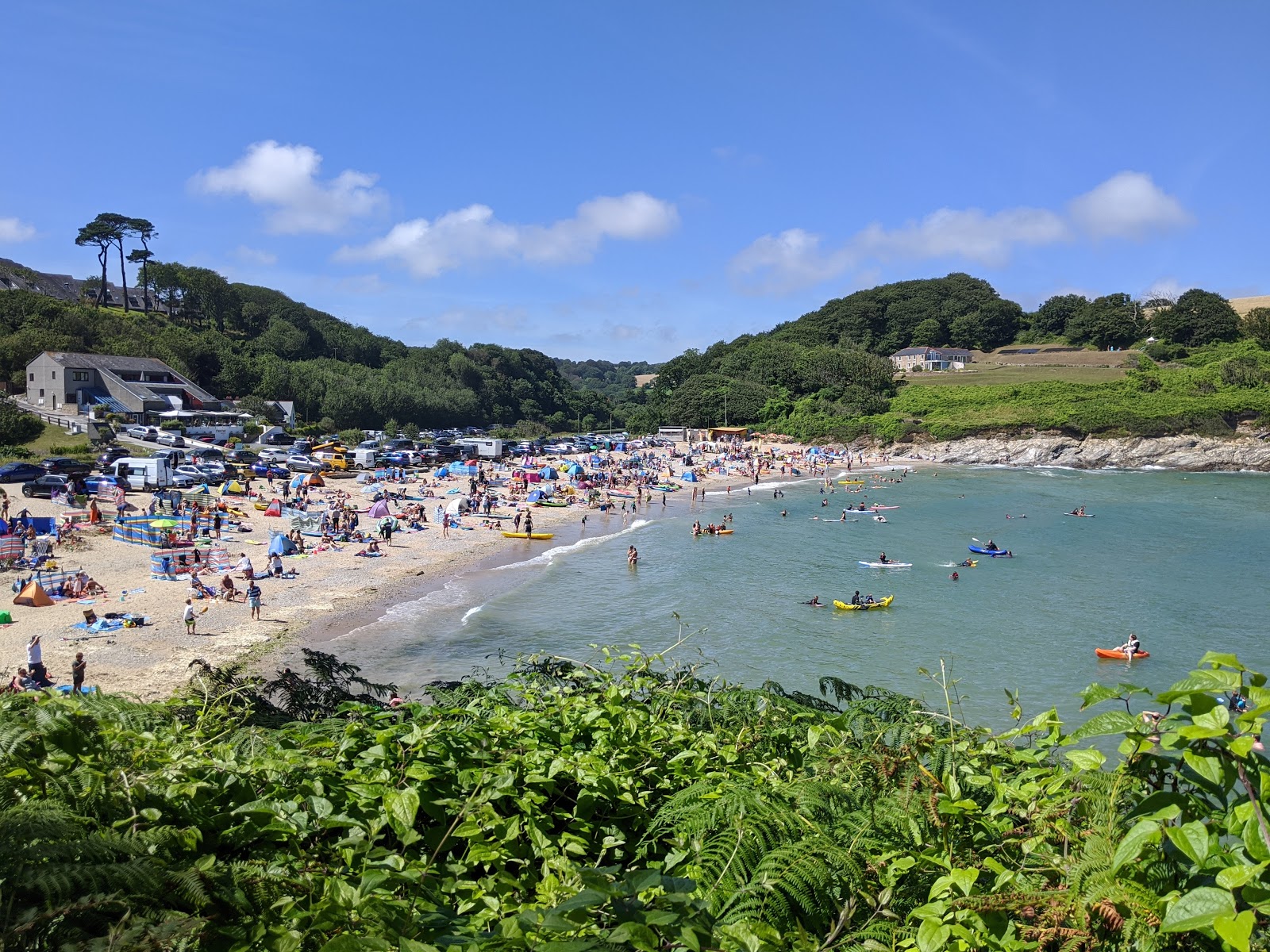 Photo of Maenporth beach with turquoise pure water surface
