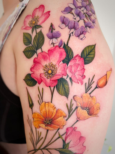 Explore hibiscus tattoo ideas, creative tattoo ideas in Montrose, available at The Story Blossom Tattoo Studio