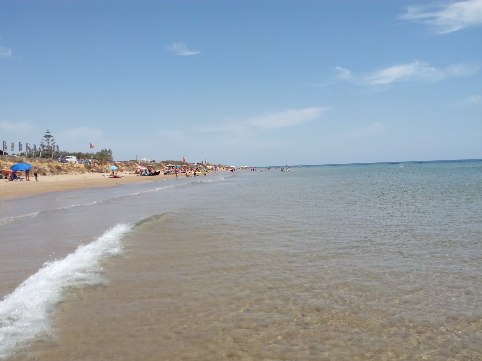 Photo of Puzziteddu beach and the settlement