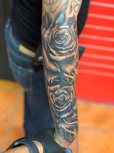 Explore rose foot tattoo ideas, creative tattoo ideas in El Paso, available at Estilo Firme Tattoo Co.