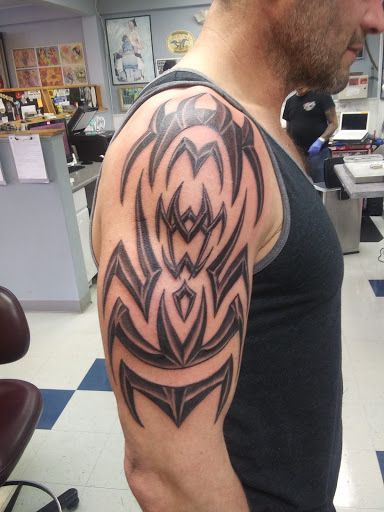 Explore money tattoo ideas, creative tattoo ideas in Libertyville, available at Art With Atattooed