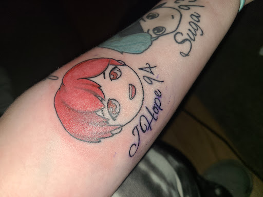 Explore american traditional elbow tattoo ideas, creative tattoo ideas in Fall River, available at Indelible Ink Tattoo Studio 2.0