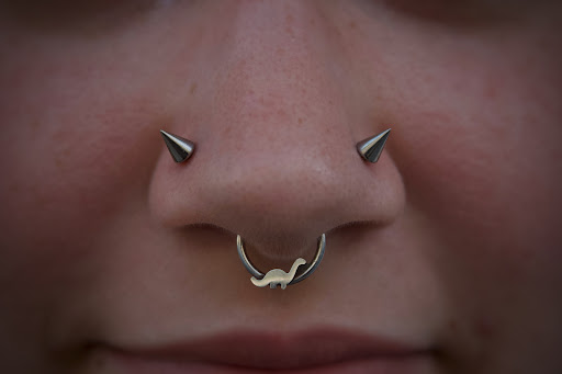 Explore minimalist tattoo ideas for men, creative tattoo ideas in Corona Del Mar, available at Rainbow Piercing & Jewelry