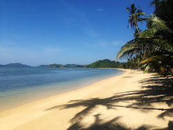 Foto von Ocam Ocam Beach mit lange, gerade küste