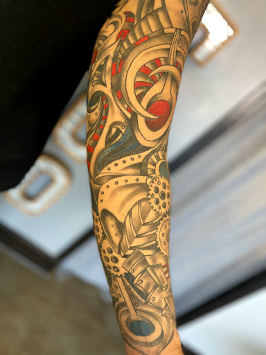 Explore travel tattoo ideas for guys, creative tattoo ideas in Navarre, available at Eleven 11 Tattoo Studio