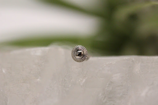 Explore fish hook tattoo ideas, creative tattoo ideas in Tallahassee, available at Magnolia Tattoo & Piercing Co.