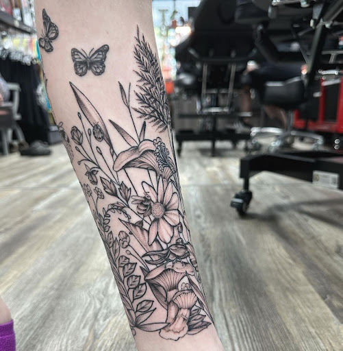 Explore tattoo half sleeve ideas, creative tattoo ideas in Ocala, available at The Tattoo Gallery of Ocala LLC