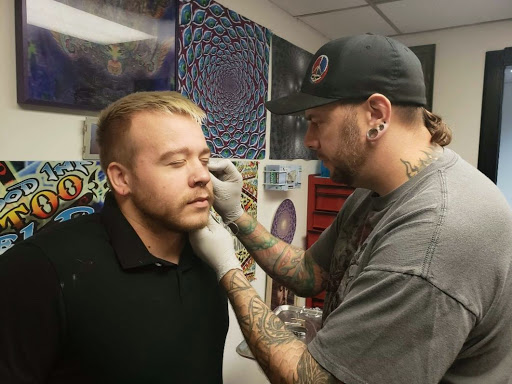 Explore cross forearm tattoo ideas, creative tattoo ideas in Spokane, available at Feel Good Ink