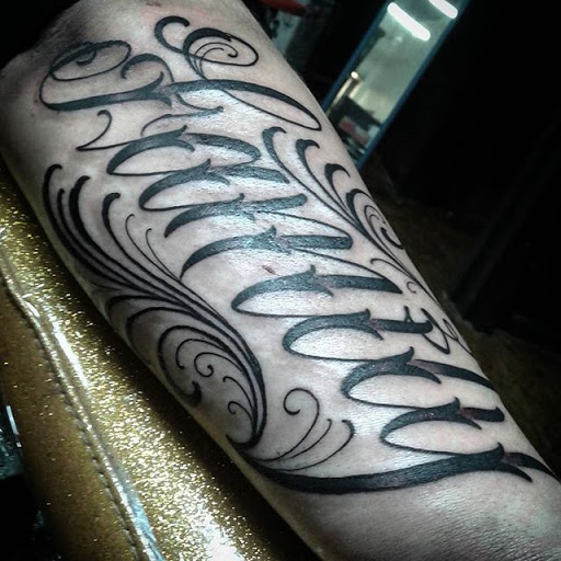 Explore american football tattoo ideas, creative tattoo ideas in Stockton, available at Stockton Tattoo & Piercing