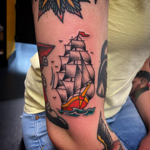 Explore cool face tattoo ideas, creative tattoo ideas in Denton, available at Black Anchor Tattoo