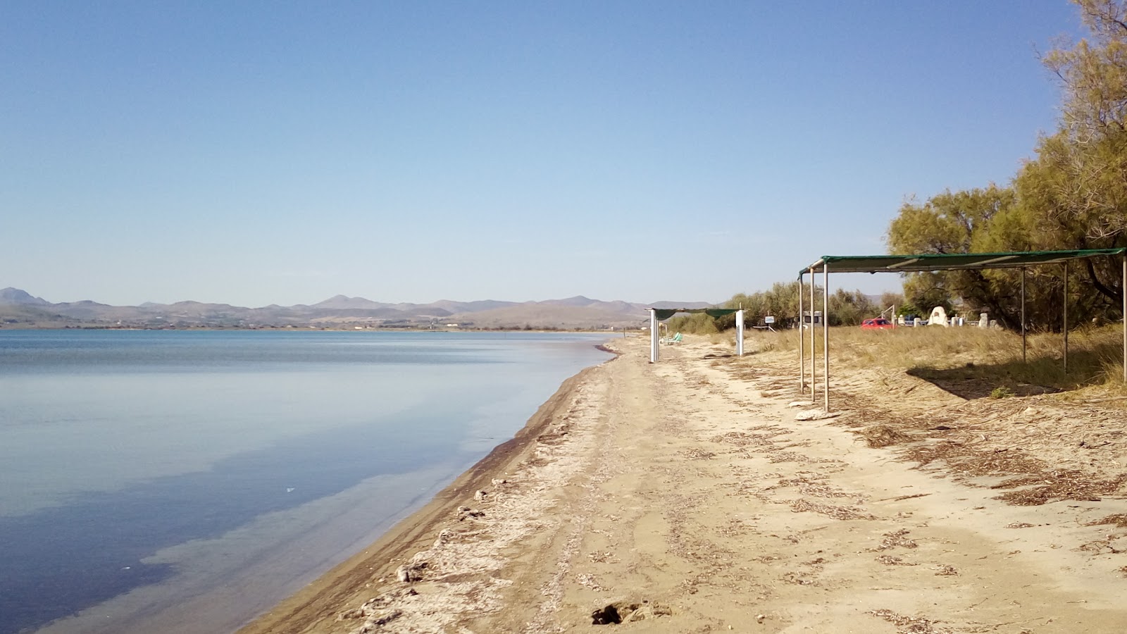 Foto von Paralia Lichnon mit langer gerader strand