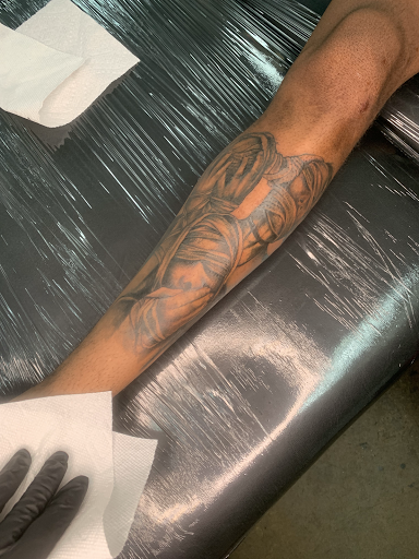 Explore haunted mansion tattoo ideas, creative tattoo ideas in Norco, available at Live Canvas Tattoo Parlour