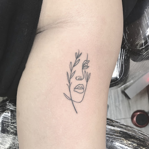 Explore mountain bike tattoo ideas, creative tattoo ideas in Miami, available at INKAHOLIK TATTOOS